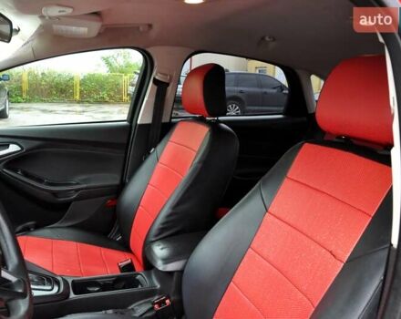 Червоний Форд Фокус, об'ємом двигуна 2 л та пробігом 207 тис. км за 6999 $, фото 18 на Automoto.ua