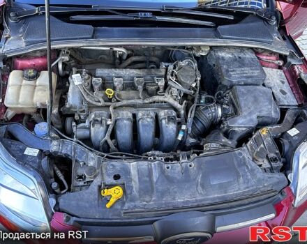 Червоний Форд Фокус, об'ємом двигуна 2 л та пробігом 204 тис. км за 7049 $, фото 4 на Automoto.ua