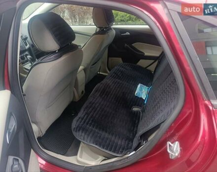 Красный Форд Фокус, объемом двигателя 2 л и пробегом 174 тыс. км за 7400 $, фото 4 на Automoto.ua