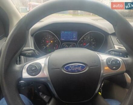 Красный Форд Фокус, объемом двигателя 2 л и пробегом 174 тыс. км за 7400 $, фото 1 на Automoto.ua