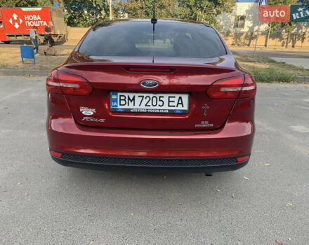 Красный Форд Фокус, объемом двигателя 2 л и пробегом 129 тыс. км за 8300 $, фото 3 на Automoto.ua