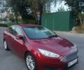 Червоний Форд Фокус, об'ємом двигуна 2 л та пробігом 102 тис. км за 7099 $, фото 1 на Automoto.ua