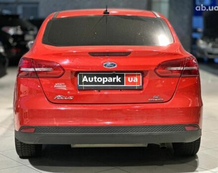 Червоний Форд Фокус, об'ємом двигуна 2 л та пробігом 162 тис. км за 9490 $, фото 4 на Automoto.ua