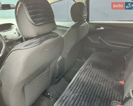 Красный Форд Фокус, объемом двигателя 2 л и пробегом 124 тыс. км за 8300 $, фото 20 на Automoto.ua