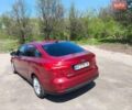 Червоний Форд Фокус, об'ємом двигуна 2 л та пробігом 151 тис. км за 6500 $, фото 1 на Automoto.ua