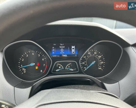 Красный Форд Фокус, объемом двигателя 2 л и пробегом 124 тыс. км за 8300 $, фото 17 на Automoto.ua