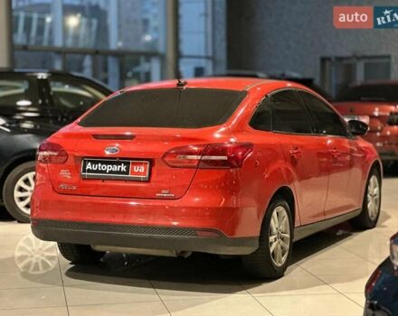 Червоний Форд Фокус, об'ємом двигуна 2 л та пробігом 162 тис. км за 9490 $, фото 1 на Automoto.ua
