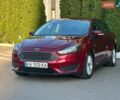 Красный Форд Фокус, объемом двигателя 2 л и пробегом 210 тыс. км за 7100 $, фото 1 на Automoto.ua