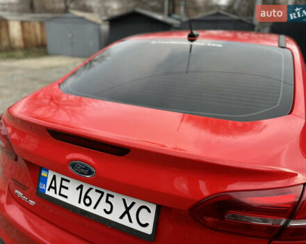 Красный Форд Фокус, объемом двигателя 2 л и пробегом 124 тыс. км за 8300 $, фото 2 на Automoto.ua