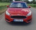 Красный Форд Фокус, объемом двигателя 2 л и пробегом 270 тыс. км за 7529 $, фото 1 на Automoto.ua