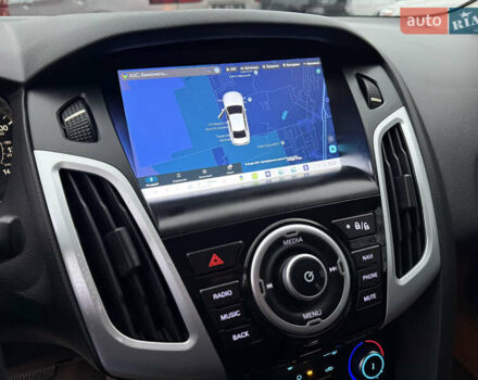 Червоний Форд Фокус, об'ємом двигуна 2 л та пробігом 92 тис. км за 7900 $, фото 42 на Automoto.ua