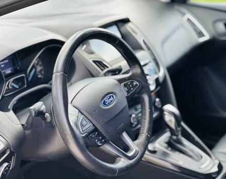 Красный Форд Фокус, объемом двигателя 2 л и пробегом 74 тыс. км за 6950 $, фото 4 на Automoto.ua