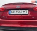 Красный Форд Фокус, объемом двигателя 2 л и пробегом 123 тыс. км за 8250 $, фото 5 на Automoto.ua