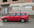 Красный Форд Фокус, объемом двигателя 1.75 л и пробегом 285 тыс. км за 2950 $, фото 4 на Automoto.ua