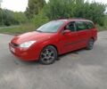 Красный Форд Фокус, объемом двигателя 1.4 л и пробегом 385 тыс. км за 2192 $, фото 1 на Automoto.ua