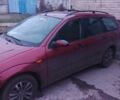 Красный Форд Фокус, объемом двигателя 1.8 л и пробегом 350 тыс. км за 2000 $, фото 2 на Automoto.ua