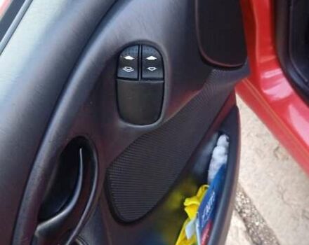 Красный Форд Фокус, объемом двигателя 1.8 л и пробегом 223 тыс. км за 3500 $, фото 3 на Automoto.ua