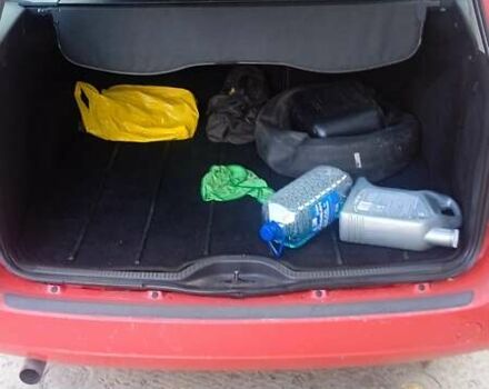 Красный Форд Фокус, объемом двигателя 1.8 л и пробегом 223 тыс. км за 3500 $, фото 7 на Automoto.ua