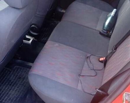 Красный Форд Фокус, объемом двигателя 1.8 л и пробегом 223 тыс. км за 3500 $, фото 6 на Automoto.ua