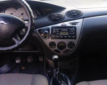 Красный Форд Фокус, объемом двигателя 1.8 л и пробегом 223 тыс. км за 3500 $, фото 5 на Automoto.ua