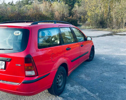 Красный Форд Фокус, объемом двигателя 1.8 л и пробегом 300 тыс. км за 2700 $, фото 2 на Automoto.ua