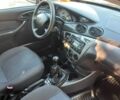 Червоний Форд Фокус, об'ємом двигуна 1.8 л та пробігом 345 тис. км за 2705 $, фото 6 на Automoto.ua