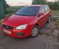 Красный Форд Фокус, объемом двигателя 1.39 л и пробегом 259 тыс. км за 3950 $, фото 1 на Automoto.ua
