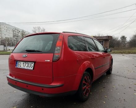 Красный Форд Фокус, объемом двигателя 1.6 л и пробегом 350 тыс. км за 2550 $, фото 12 на Automoto.ua