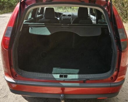 Червоний Форд Фокус, об'ємом двигуна 1.6 л та пробігом 350 тис. км за 4399 $, фото 5 на Automoto.ua