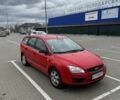 Червоний Форд Фокус, об'ємом двигуна 1.6 л та пробігом 257 тис. км за 3399 $, фото 1 на Automoto.ua