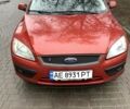 Красный Форд Фокус, объемом двигателя 1.8 л и пробегом 300 тыс. км за 4200 $, фото 1 на Automoto.ua