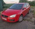 Красный Форд Фокус, объемом двигателя 1.39 л и пробегом 259 тыс. км за 3950 $, фото 1 на Automoto.ua