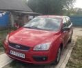 Красный Форд Фокус, объемом двигателя 1.6 л и пробегом 390 тыс. км за 1900 $, фото 1 на Automoto.ua