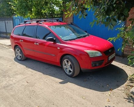 Красный Форд Фокус, объемом двигателя 1.6 л и пробегом 295 тыс. км за 3950 $, фото 1 на Automoto.ua
