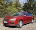 Червоний Форд Фокус, об'ємом двигуна 1.6 л та пробігом 350 тис. км за 4399 $, фото 1 на Automoto.ua