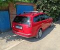 Красный Форд Фокус, объемом двигателя 1.6 л и пробегом 295 тыс. км за 3950 $, фото 2 на Automoto.ua
