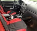 Красный Форд Фокус, объемом двигателя 1.8 л и пробегом 300 тыс. км за 4200 $, фото 2 на Automoto.ua