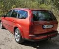 Червоний Форд Фокус, об'ємом двигуна 1.6 л та пробігом 350 тис. км за 4399 $, фото 2 на Automoto.ua