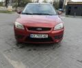 Красный Форд Фокус, объемом двигателя 1.6 л и пробегом 256 тыс. км за 5700 $, фото 1 на Automoto.ua