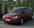 Красный Форд Фокус, объемом двигателя 1.6 л и пробегом 266 тыс. км за 4900 $, фото 1 на Automoto.ua