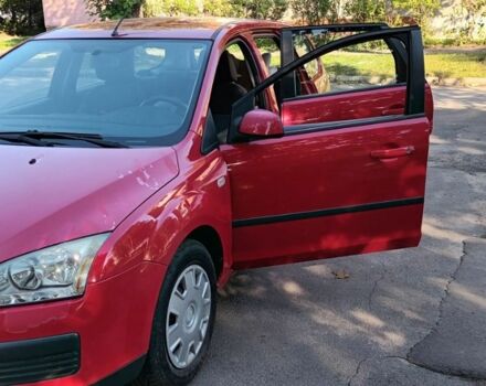 Красный Форд Фокус, объемом двигателя 1.8 л и пробегом 247 тыс. км за 4300 $, фото 1 на Automoto.ua