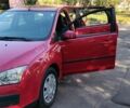 Красный Форд Фокус, объемом двигателя 1.8 л и пробегом 247 тыс. км за 4300 $, фото 1 на Automoto.ua