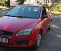 Красный Форд Фокус, объемом двигателя 1.8 л и пробегом 247 тыс. км за 4300 $, фото 1 на Automoto.ua