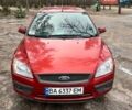 Красный Форд Фокус, объемом двигателя 1.6 л и пробегом 235 тыс. км за 5200 $, фото 1 на Automoto.ua
