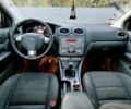 Красный Форд Фокус, объемом двигателя 1.6 л и пробегом 238 тыс. км за 5013 $, фото 6 на Automoto.ua