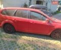 Красный Форд Фокус, объемом двигателя 1.56 л и пробегом 260 тыс. км за 5500 $, фото 1 на Automoto.ua