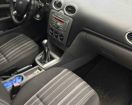 Красный Форд Фокус, объемом двигателя 1.56 л и пробегом 167 тыс. км за 4500 $, фото 7 на Automoto.ua