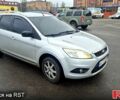 Красный Форд Фокус, объемом двигателя 1.4 л и пробегом 350 тыс. км за 3500 $, фото 1 на Automoto.ua