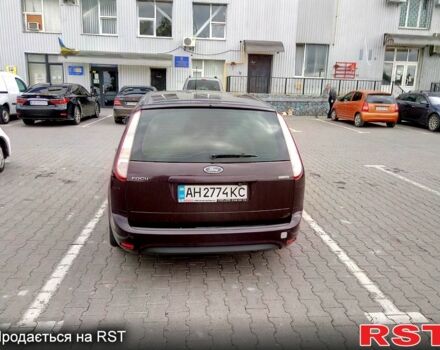Красный Форд Фокус, объемом двигателя 1.8 л и пробегом 274 тыс. км за 5500 $, фото 7 на Automoto.ua