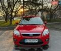 Красный Форд Фокус, объемом двигателя 2 л и пробегом 210 тыс. км за 6300 $, фото 1 на Automoto.ua